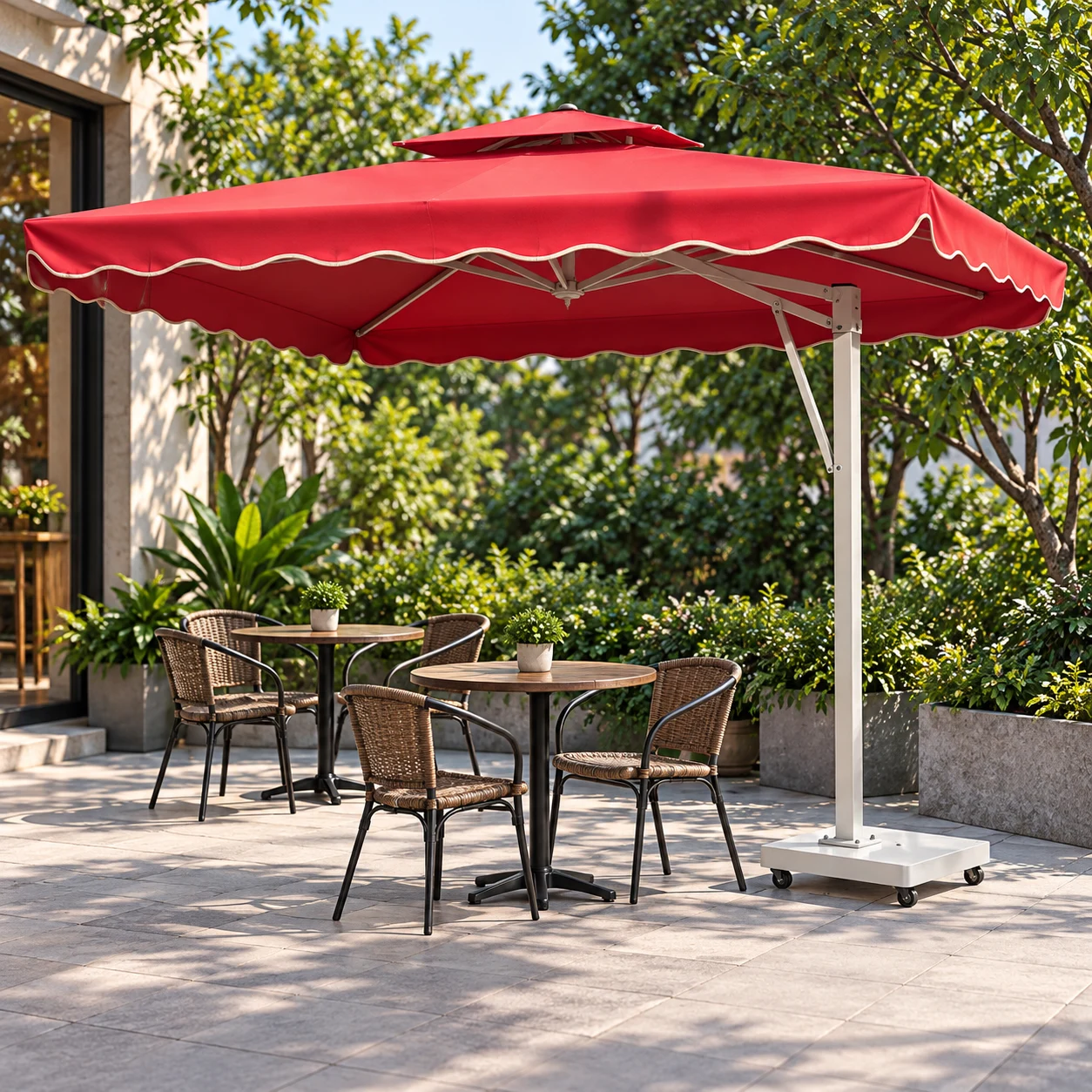 Minh họa ô lệch tâm vuông đỏ có diềm viền kem, trụ xám lệch bên và đế bánh xe cạnh hai bàn cafe